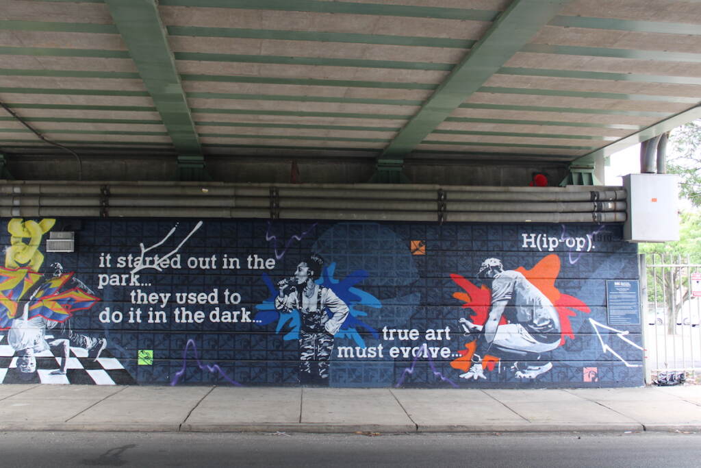 A mural shows different elements of hip hop