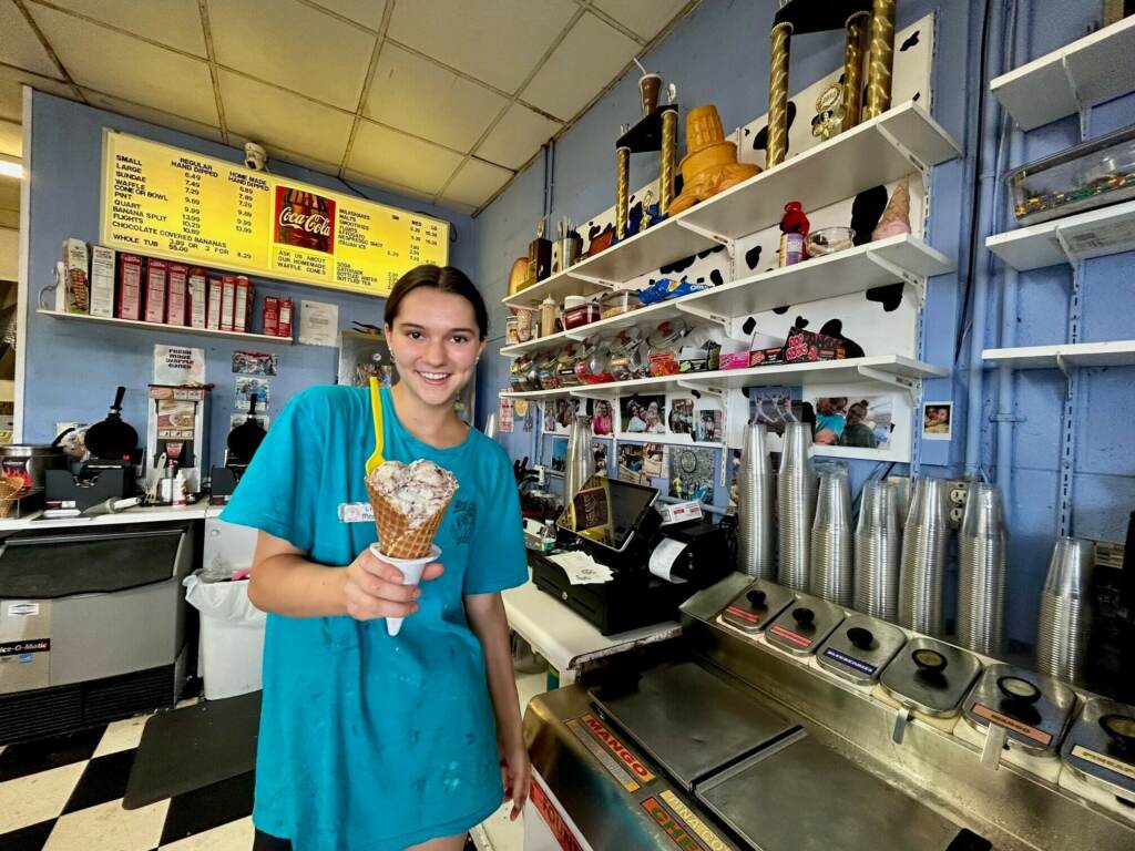 Lily Sakellariou, 19, recreates an almond joy flavored ice cream cone that President Biden had at the "Ice Cream Shop" in Rehoboth Beach several years ago.
