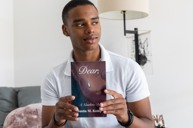 Justin Kemp, 17, author of “Dear,” a book about his mental health journey. (Kimberly Paynter/WHYY)