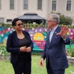 Michelle Carrera speaking with Bill Rogers