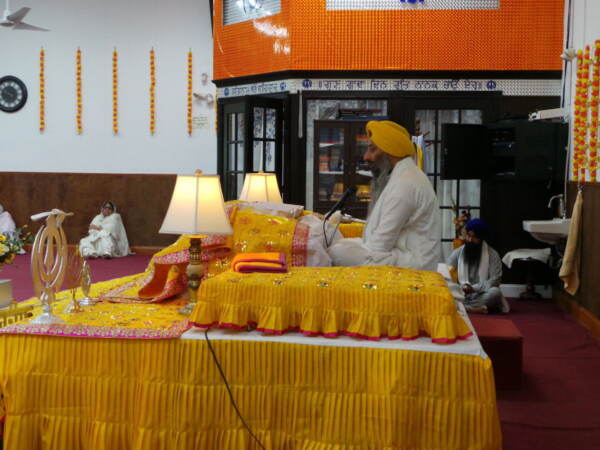 Head Priest Giani Gurjit Singh reciting hymns