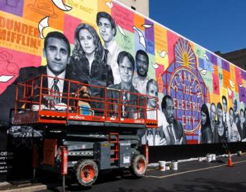 Philadelphia artist Kala Hagopian puts finishing touches on “The Office” mural in Scranton, supported by NBC and Peacock with the authorization of all 17 actors