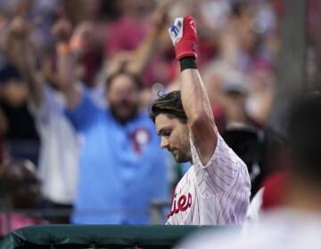 Philadelphia Phillies' Trea Turner acknowledges the crowd after hitting a three-run home run during the sixth inning of a baseball game against the Kansas City Royals, Saturday, Aug. 5, 2023, in Philadelphia.