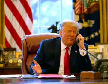 Trump talks to someone on the phone