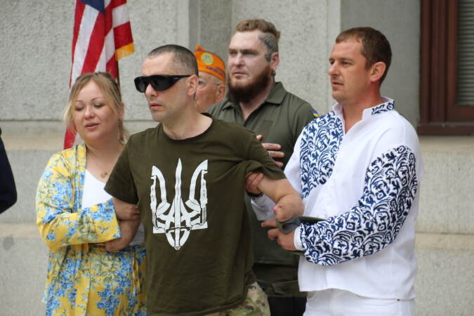 Veterans together at the Ukrainian flag raising at City Hall