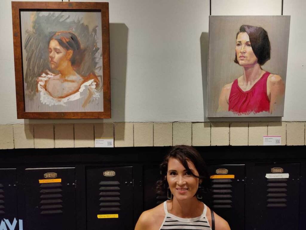 Giselle Minihulova, of Crimea, at Studio Incamminati with a portrait of herself and her daughter Adelina