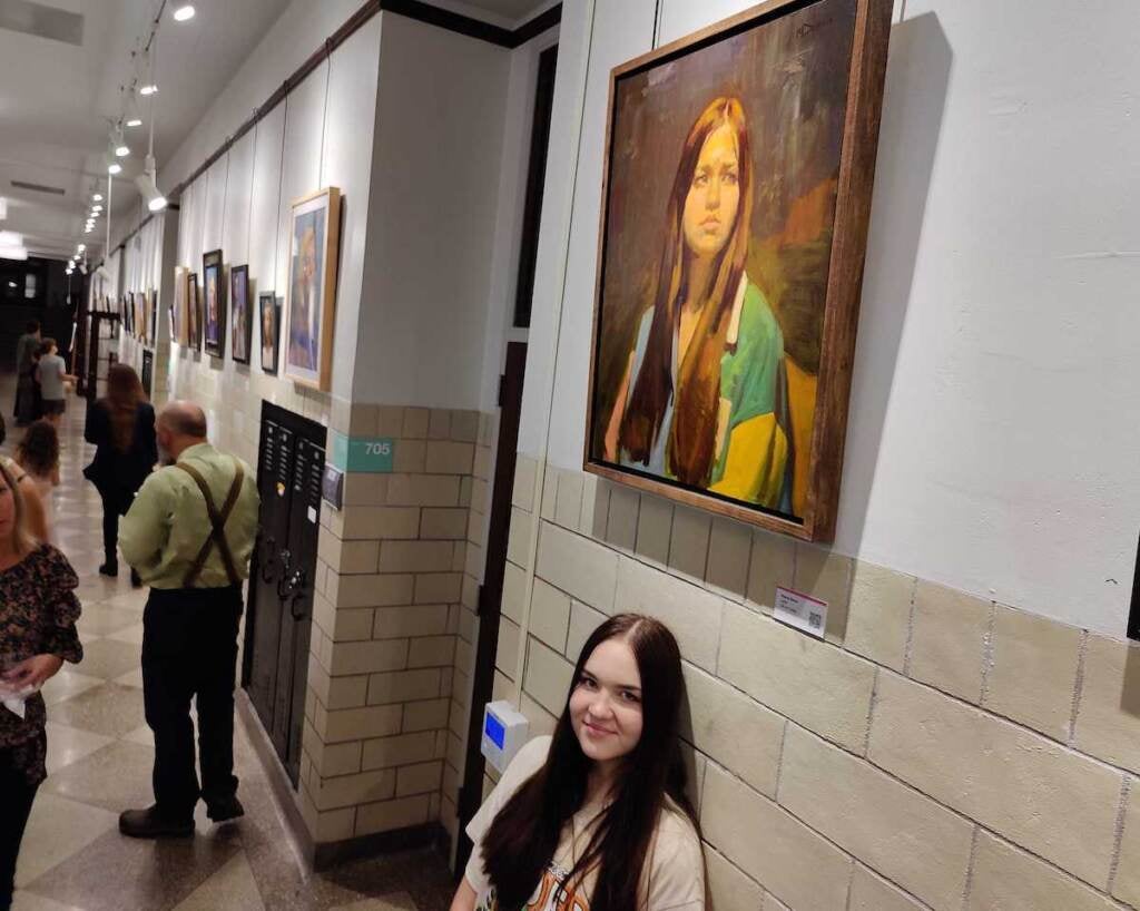 Julie Levytskyi at Studio Incamminati with her portrait.