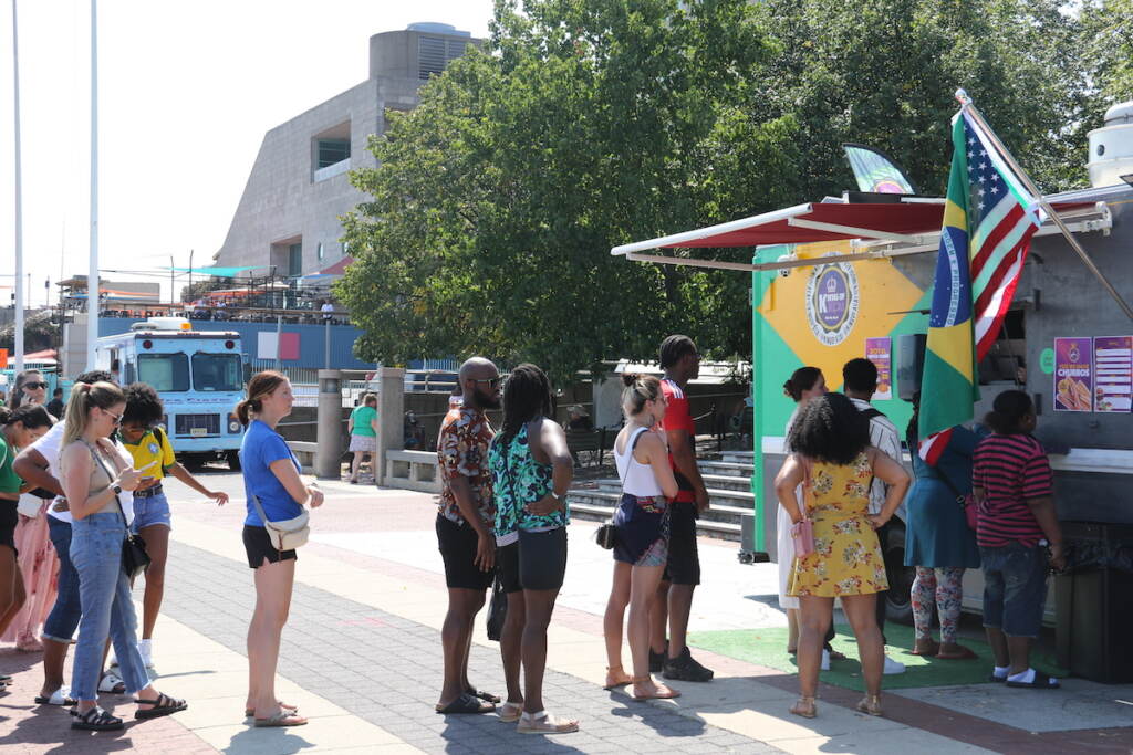 Attendees waited in line to try out some selections from the culture's cuisine, including acai and Brazilian steak