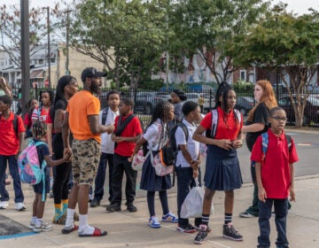 students lining up outside of school