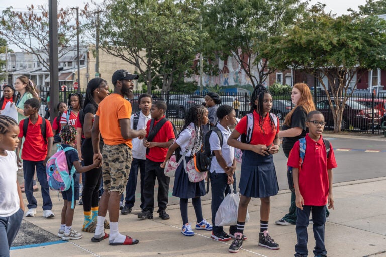 students lining up outside of school