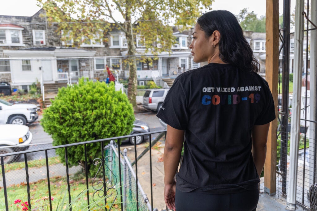 Nilda Diaz standing on her front porch