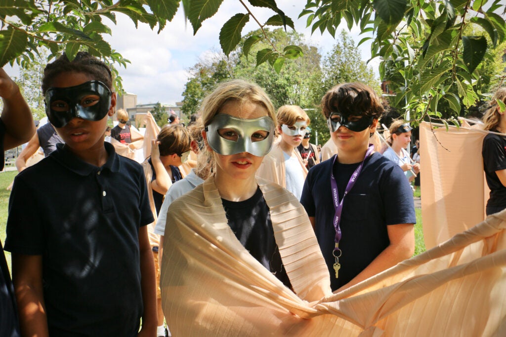 Students dress as a flock of pigeons