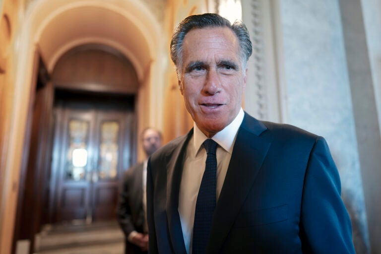 Sen. Mitt Romney, R-Utah, arrives at the chamber for votes, at the Capitol in Washington, Wednesday, Sept. 6, 2023.