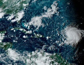 This satellite image provided by the National Oceanographic and Atmospheric Administration shows Hurricane Lee, right, in the Atlantic Ocean on Friday, Sept. 8, 2023, at 4:50 p.m. EDT. Lee is rewriting old rules of meteorology, leaving experts astonished at how rapidly it grew into a goliath Category 5 hurricane.