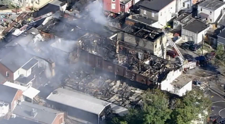 Damage is seen via helicopter after a four-alarm fire tore through multiple buildings in Oxford, Chester County.
