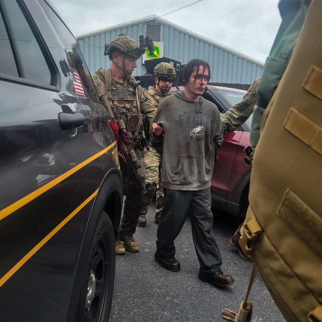 Danelo Cavalcante is captured by law enforcement.