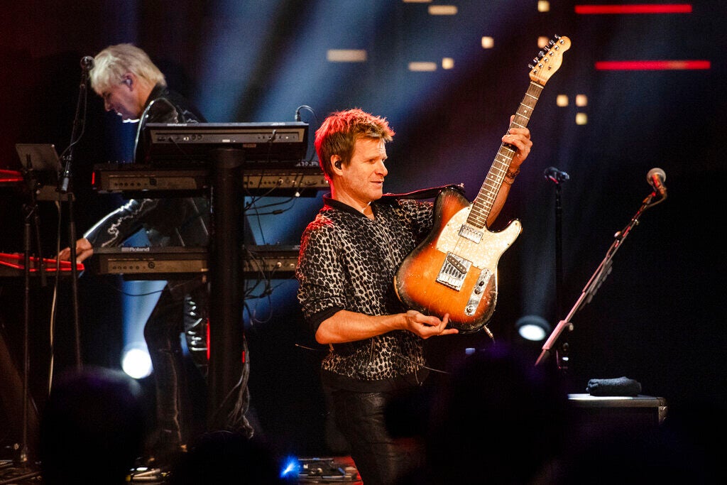 Nick Rhodes, left, and Andy Taylor of Duran Duran perform in concert