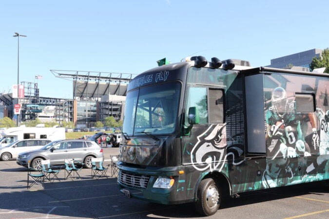 A camper with Eagles players displayed on it is parked outside of Lincoln Financial Field.