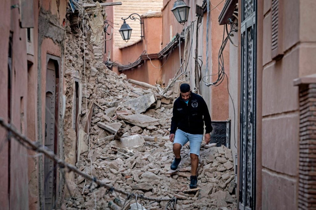 A resident navigates through the rubble following a 6.8-magnitude quake in Marrakesh on Saturday.