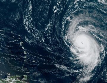 Hurricane Lee formed a well-defined eye wall on Thursday. The storm is seen here in a satellite image from around noon ET Thursday, showing the Leeward Islands and Puerto Rico to the west