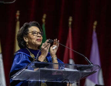 JoAnne A. Epps speaking at a podium