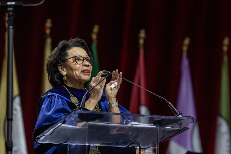 JoAnne A. Epps speaking at a podium