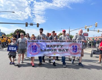 Workers marching in parade