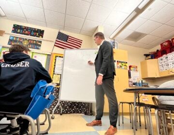 Matt Meyer teaching a class in a school room