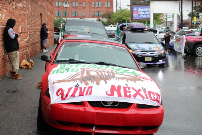 Cars decorated with the Mexican flag formed a parade through Philadelphia on Sept. 10, 2023, in celebration of Mexican Independence Day. (Emily Neil/WHYY)