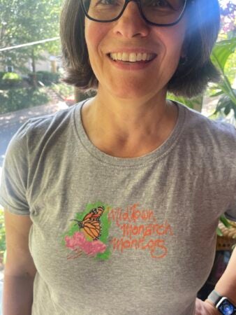 Jessica Reed wearing a shirt that says 'Midtown Monarch Monitors'