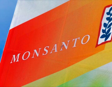 A sign reads Monsanto.