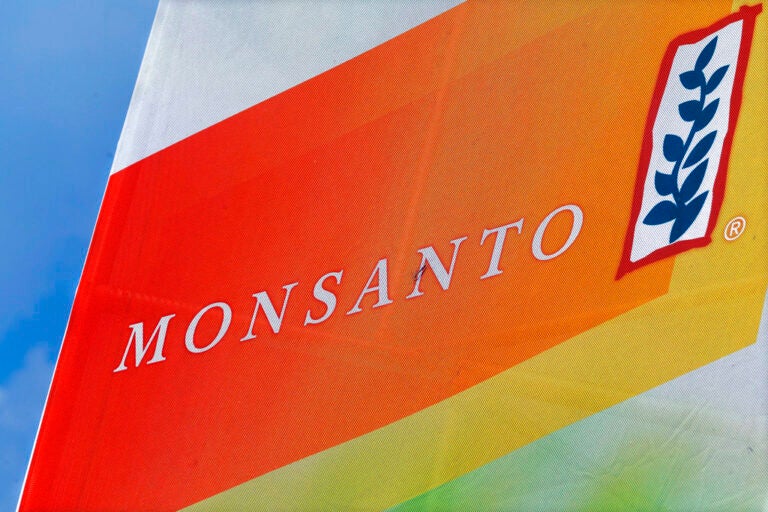 A sign reads Monsanto.