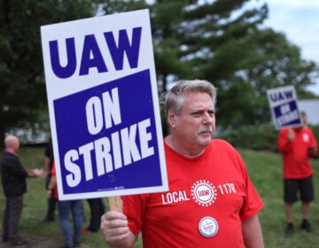 UAW workers picket outside of the Stellantis Mopar parts facility in Naperville, Ill., on Sept. 22, 2023. The UAW strike against Big Three automakers may not have much of an impact on car shoppers, though that could change. (Scott Olson/Getty Images)