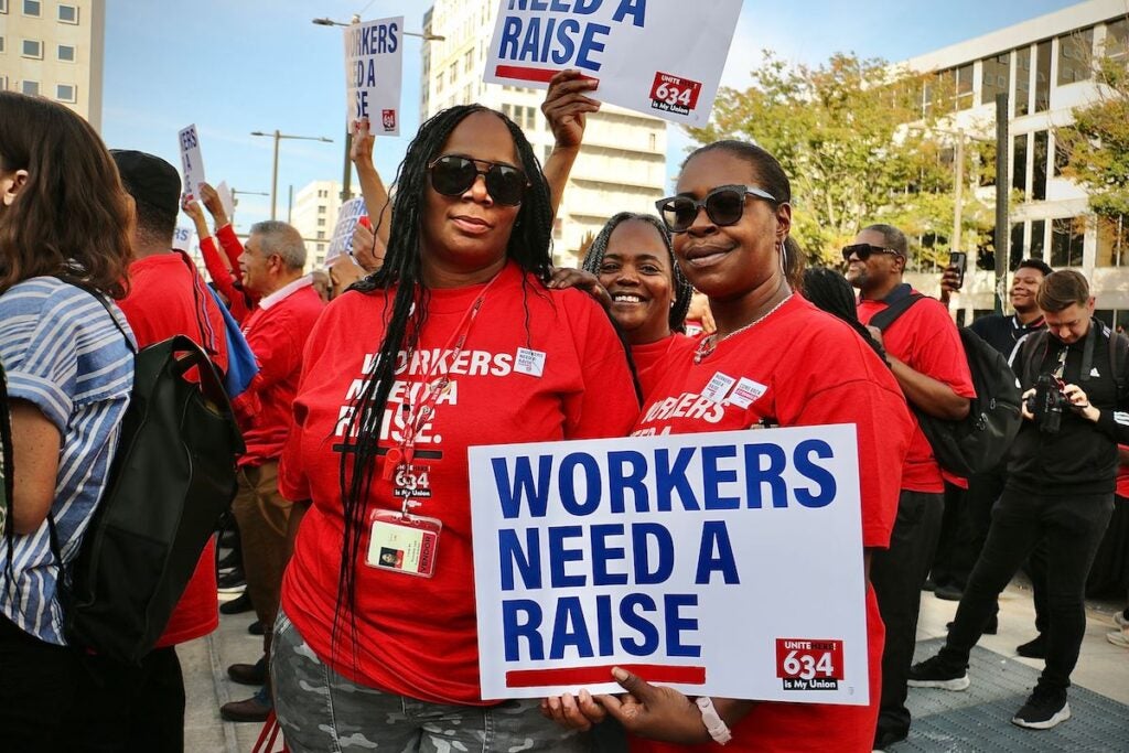 Union representatives Ronette Lark (left) and Dajenaba Blackwell pose for a photo at the rally.