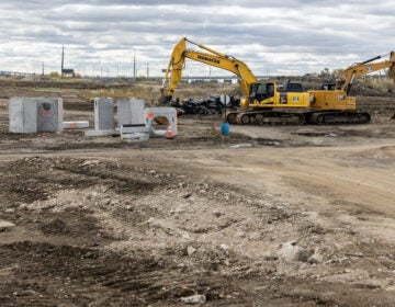 Construction equipment at the site of the former PES Refinery