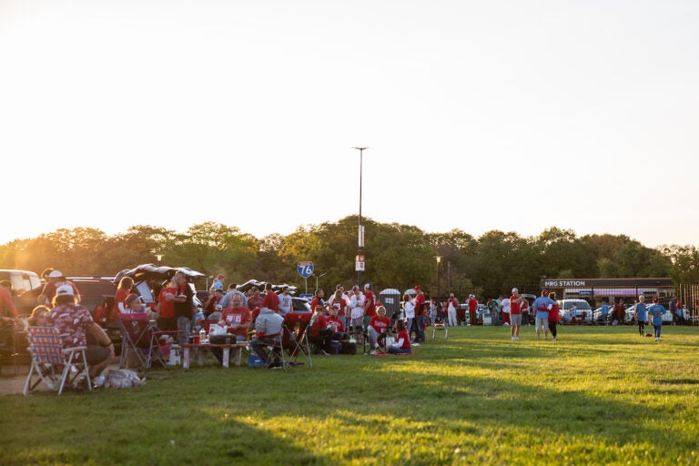 Familes tailgate together in the parking lots surround Citzens Bank Park for Game 4 of the Phillies playoff series game on October 12 2023. (Emily Cohen for WHYY