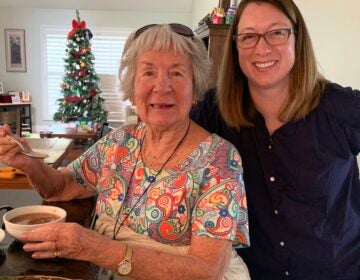 Reporter Kerry Sheridan with her grandmother Olga Smith making 