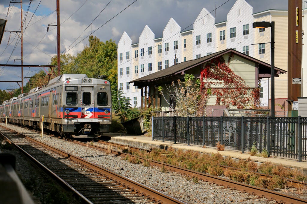A SEPTA train passes by the Ambler Freight House