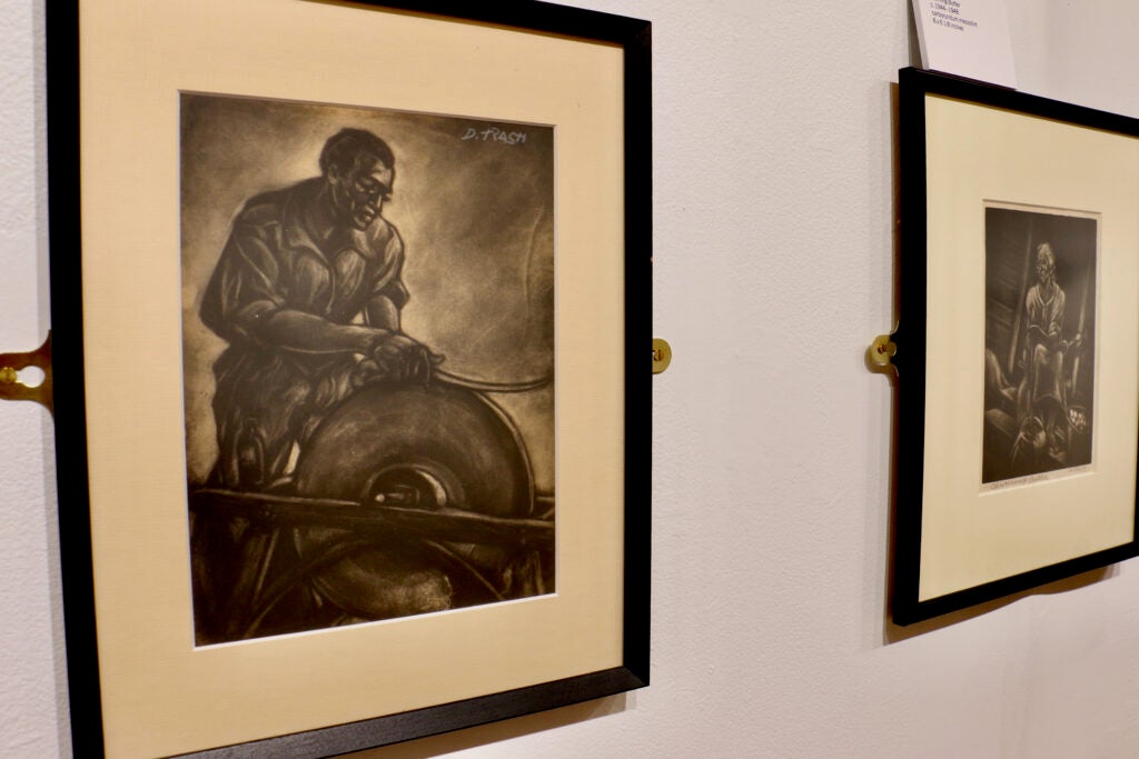 A person churning butter in a print by Dox Thrash