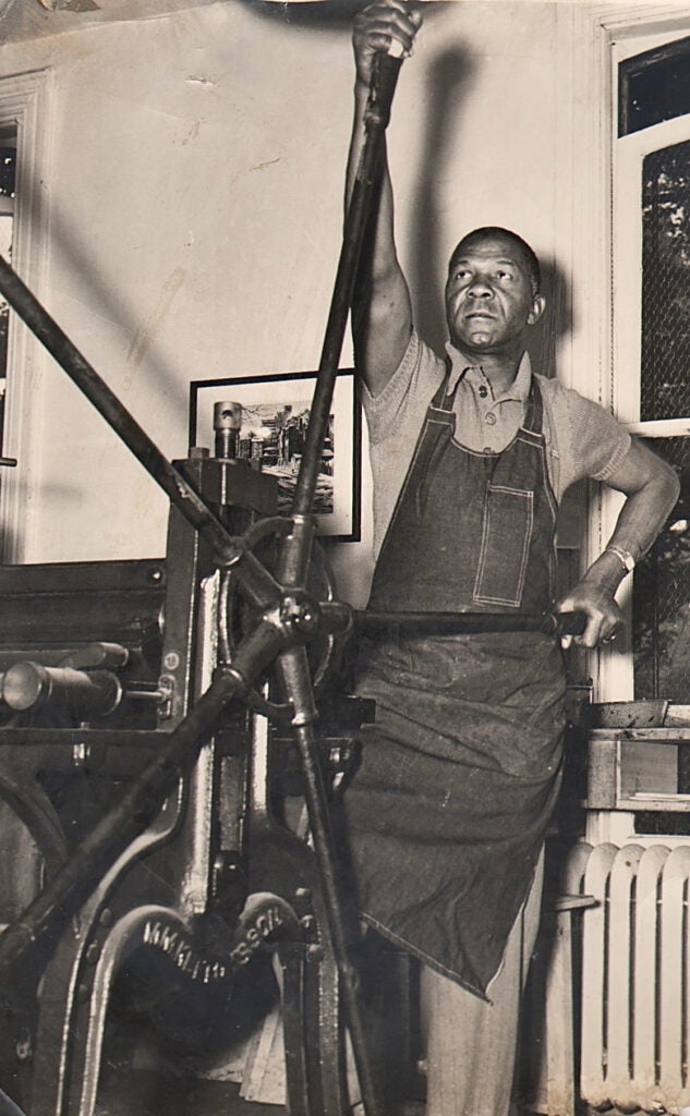 Dox Thrash at his printing press