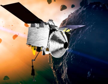 This illustration provided by NASA depicts the OSIRIS-REx spacecraft at the asteroid Bennu. On Sunday, Sept. 24, 2023, the spacecraft droped off rubble it grabbed from the asteroid Bennu, closing out a seven-year quest. (Conceptual Image Lab/Goddard Space Flight Center/NASA via AP, File)