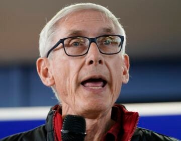 File photo: Wisconsin Democratic Gov. Tony Evers speaks at a campaign stop, Oct. 27, 2022, in Milwaukee. A man illegally brought a handgun into the Wisconsin Capitol on Wednesday, demanding to see Gov. Tony Evers, and returned at night with an assault rifle after posting bail, a spokesperson for the state said Thursday, Oct. 5, 2023