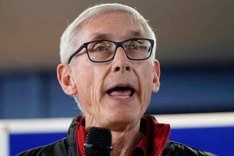 File photo: Wisconsin Democratic Gov. Tony Evers speaks at a campaign stop, Oct. 27, 2022, in Milwaukee. A man illegally brought a handgun into the Wisconsin Capitol on Wednesday, demanding to see Gov. Tony Evers, and returned at night with an assault rifle after posting bail, a spokesperson for the state said Thursday, Oct. 5, 2023