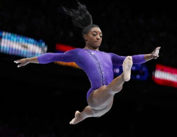 United States' Simone Biles competes on the beam during the apparatus finals at the Artistic Gymnastics World Championships in Antwerp, Belgium, Sunday, Oct. 8, 2023.