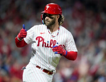 Philadelphia Phillies' Bryce Harper celebrates after a home run against the Arizona Diamondbacks during the first inning in Game 1 of the baseball NL Championship Series in Philadelphia, Monday, Oct. 16, 2023.