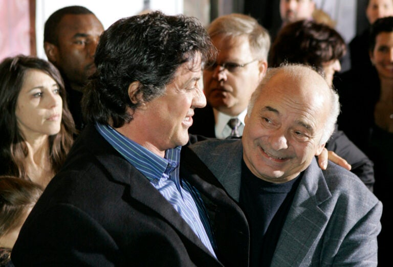 File photo: Burt Young (right) and Sylvester Stallone, star of the movie ''Rocky Balboa,'' attend the film's premiere in Philadelphia, Dec. 18, 2006. Burt Young, the Oscar-nominated actor who played Paulie, the rough-hewn, mumbling-and-grumbling best friend, corner-man and brother-in-law to Sylvester Stallone in the “Rocky” franchise, has died. Young died Oct. 8, 2023 in Los Angeles.