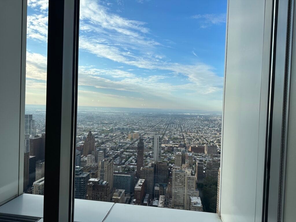 Looking out a window at the Philadelphia skyline