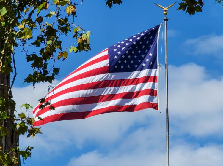 American flag flying on a sunny day