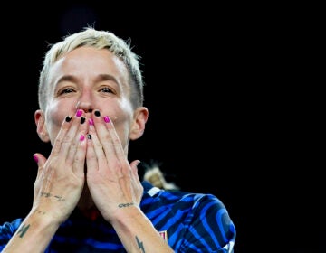 OL Reign forward Megan Rapinoe blows a kiss during a ceremony honoring her career, after the team's NWSL soccer match against the Washington Spirit on Friday, Oct. 6, 2023, in Seattle. The Spirit and the Reign played to a scoreless draw in Rapinoe's final regular-season home game before her retirement at the end of the season.