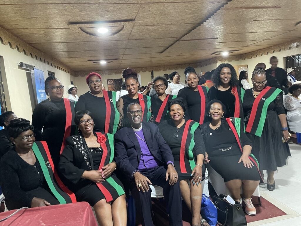 Bishop Beaman poses with congregants